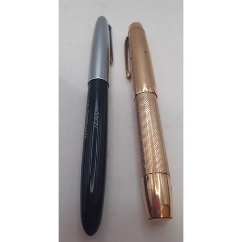 11 - Two vintage pens comprising a gold tone fountain pen having a 14ct De La Rue Onoto nib and a Waterma... 