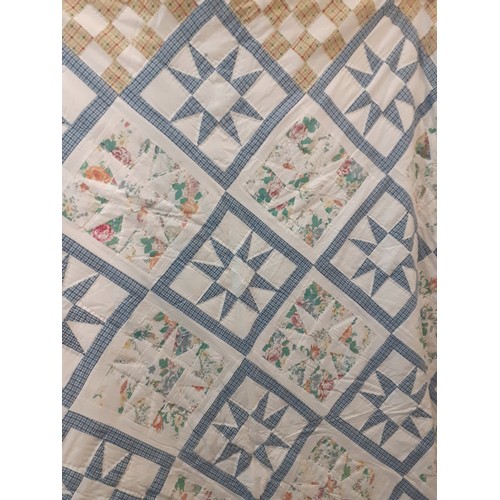 93 - A late 20th Century shop bought and machine made patchwork quilt 75