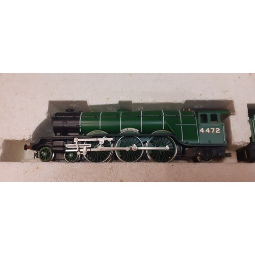 39 - Hornby- A boxed OO gauge Flying Scotsman electric train set, incomplete (some pieces of track missin... 