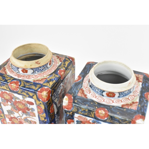 152 - A pair of 19th century Japanese imari tea caddies, of rectangular form with blue and red floral desi... 