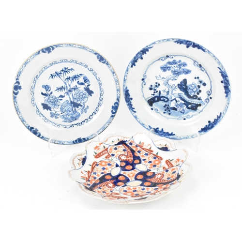 153 - Two 18th century Chinese blue and white porcelain plates, together with a Japanese Imari plate with ... 