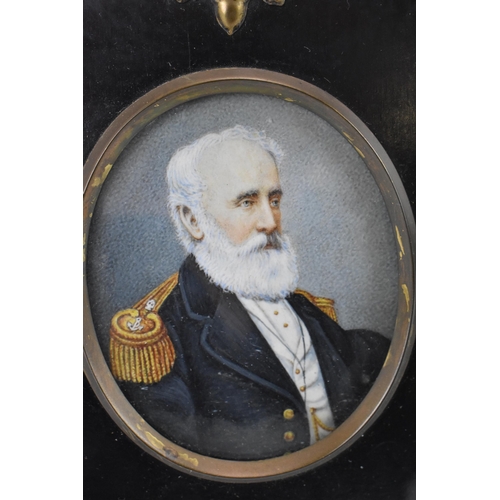 159 - A Victorian portrait miniature on ivory of Captain Welman, circa 1860, within a black painted frame ... 