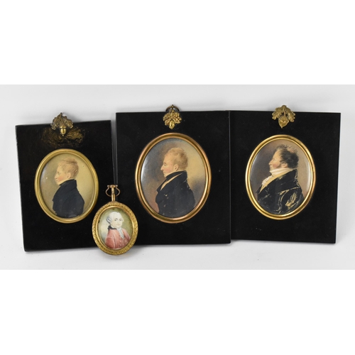 161 - A collection of three early 19th century portrait miniatures on card, depicting a boy, a young gentl... 