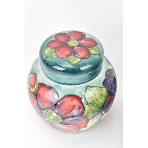 175 - A Walter Moorcroft 'Anemone' pattern pottery ginger jar, circa 1953-1978, with tubelined blooms, the... 