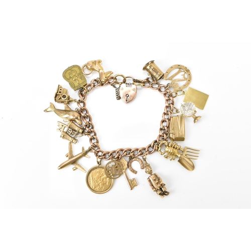 189 - A 9ct rose gold charm bracelet, with a Victorian 1900 half sovereign coin, and various hanging charm... 