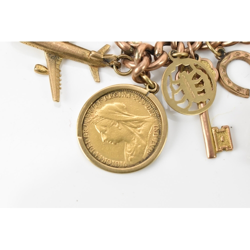 189 - A 9ct rose gold charm bracelet, with a Victorian 1900 half sovereign coin, and various hanging charm... 