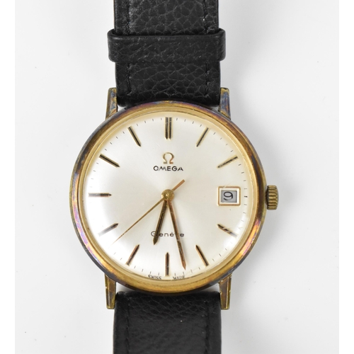 22 - An Omega, manual wind, gents, gold plated wristwatch, having a silvered dial, centre seconds, date a... 
