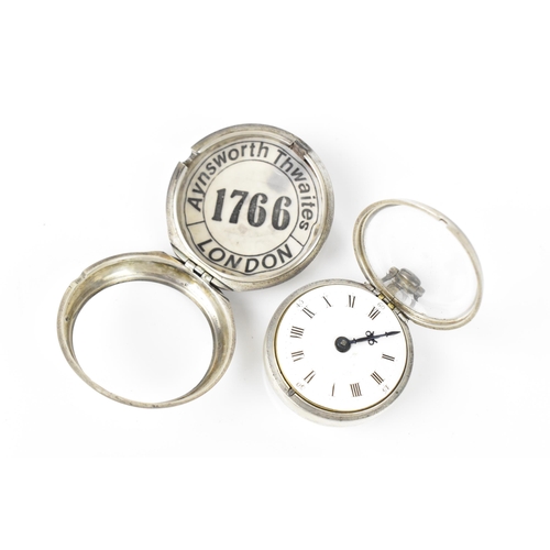 34 - An early George III silver pair cased pocket watch, the white enamel dial having Roman numerals and ... 