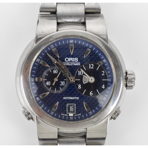 36 - An Oris Worldtimer, automatic, gents, stainless steel wristwatch, having a blue dial, subsidiary sec... 