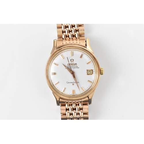 43 - An Omega Constellation, automatic, gents, gold plated wristwatch, having a white dial, centre second... 