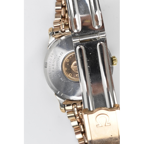 43 - An Omega Constellation, automatic, gents, gold plated wristwatch, having a white dial, centre second... 