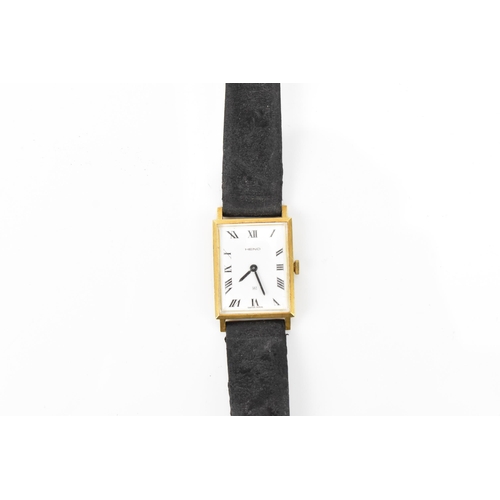 48 - A Heno, manual wind, gents, 18ct gold wristwatch, having a white dial with Roman numerals, the caseb... 