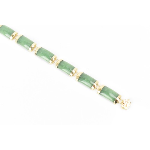 193 - A Chinese 14ct yellow gold and green jade coloured bracelet, with rectangular links, the clasp with ... 