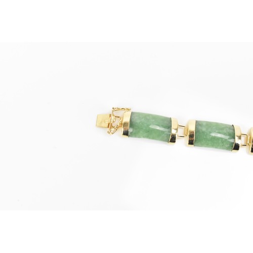 193 - A Chinese 14ct yellow gold and green jade coloured bracelet, with rectangular links, the clasp with ... 