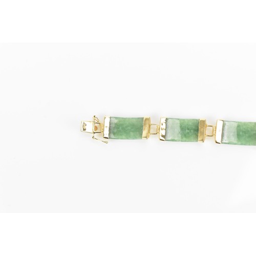 193 - A Chinese 14ct yellow gold and green jade coloured bracelet, with rectangular links, the clasp with ... 