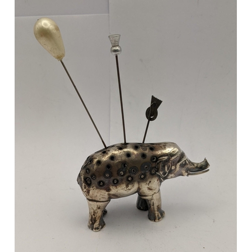 111 - A white metal pin cushion in the form of an elephant A/F
Location: CAB1