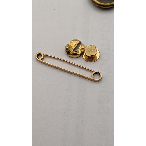 120 - Mixed gold and yellow metal to include a bar brooch stamped 10k, along with a 9ct gold portrait pend... 