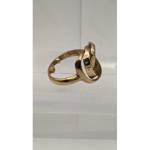 135 - A 9ct gold ring having a repeated oval design, total weight 7.4g Location: CAB4