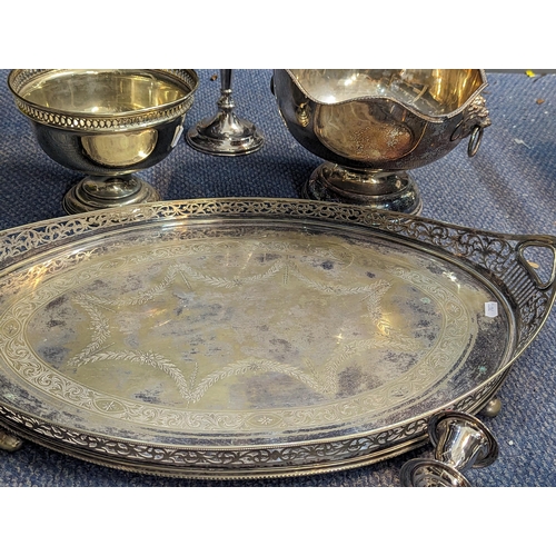 220 - Silver plated items to include an ice bucket having lion mask handles, large tray, three arm candela... 