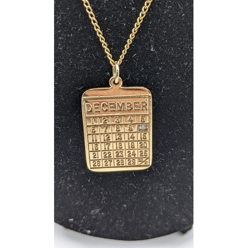 50 - A 9ct gold calendar pendant set with a diamond on a 9ct gold necklace total weight 9.5g
Location: CA... 