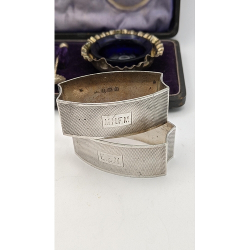 67 - Silver to include a pair of napkin rings, a child's pusher and a pair of salts, cased, 115g
Location... 