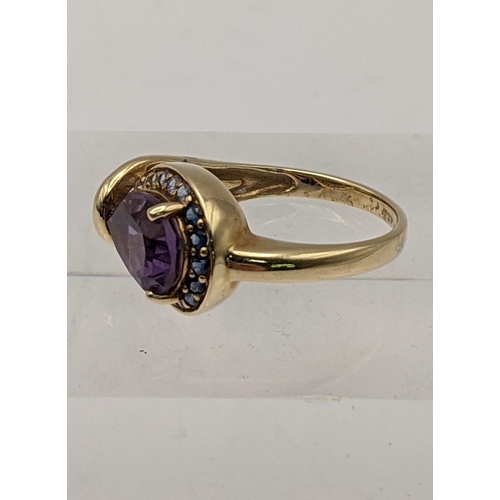 73 - A 9ct gold pear cut amethyst and sapphire ring, total weight 3.8g 
Location: RING