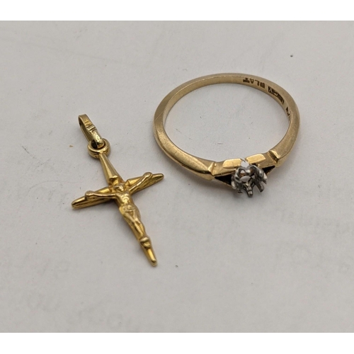 10 - A 18ct gold solitaire ring (stone missing) together with a 18ct gold cross pendant, total weight 2.4... 