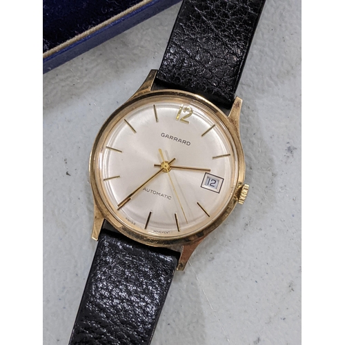 176 - A Garrard 9ct gold automatic gents wristwatch together with Garrard box
Location: A4T