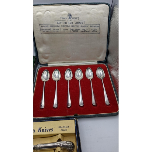 184 - Six silver tea spoons boxed, 22.4g together with a boxed set of six silver handled butter knives and... 