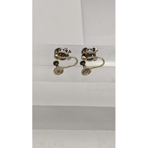 185 - A pair of 9ct gold screw earrings, each set with an emerald, 3.6g
Location:  CAB8