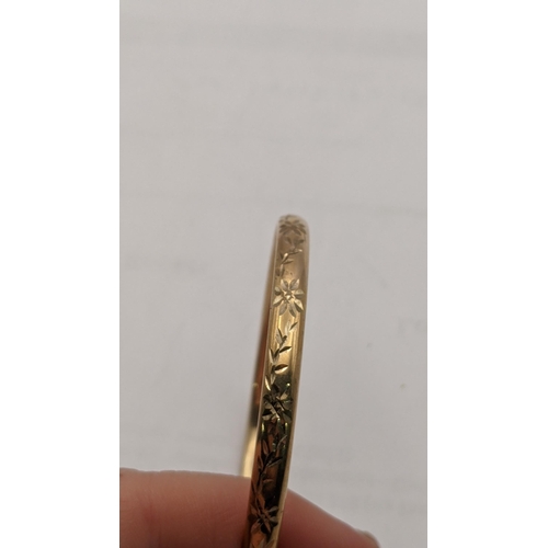 21 - A 9ct gold bracelet with a floral engraved design 5.7g
Location: CAB1