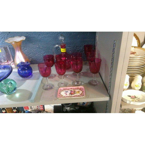 247 - Nine cranberry glass wines, a decanter A/F, and a Limoges dish
Location: 3.1