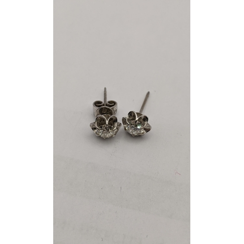 3 - A pair of 18ct white gold diamond earrings 1.7g, A/F
Location: CAB6