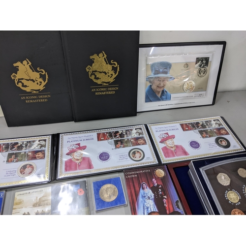 313 - A quantity of commemorative coins and coin sets to include 2000 UK Brilliant uncirculated proof set,... 