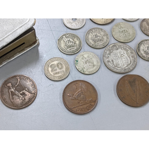 314 - A group of mixed coins early 20th century and later to include a 1927 Straits Settlement twenty cent... 