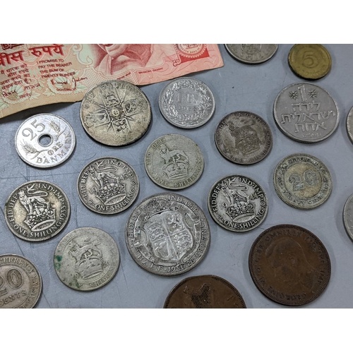 314 - A group of mixed coins early 20th century and later to include a 1927 Straits Settlement twenty cent... 