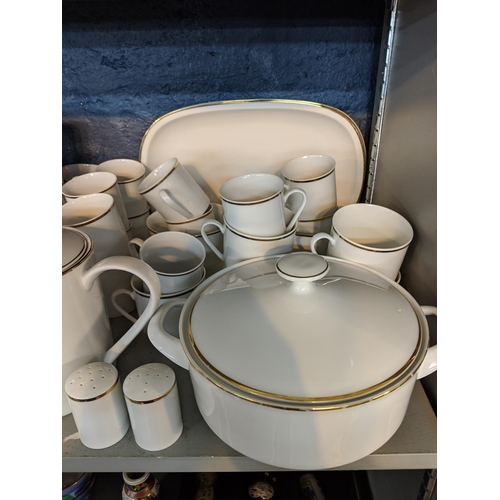 321 - An Arazberg white with gold rim dinner service, to include dinner plates, side plater, cups, saucers... 