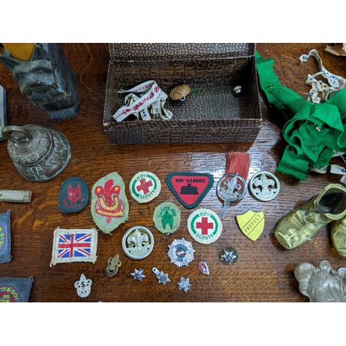 273 - A mixed lot of 1960s cloth and metal boy scout badges, diecast Dinky Toy vehicles including a boxed ... 