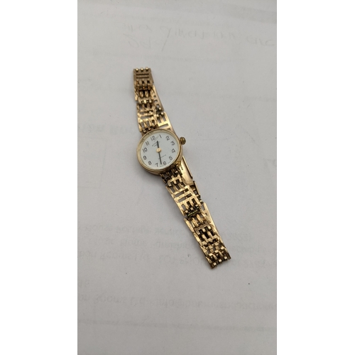 12 - A 9ct gold ladies manual wind wristwatch and a 9ct gold bracelet, total weight 13.1g
Location: CAB3