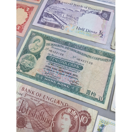 379 - Mixed banknotes from around the world to include a 1973 Hong Kong and Shanghai Banking corporation T... 