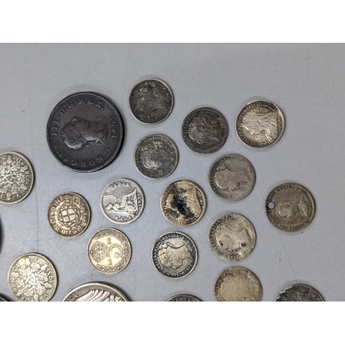 384 - Mixed coins of interest to include 1815 Bank token 3 Shilling, Maundy coinage, George III, 1795 penn... 