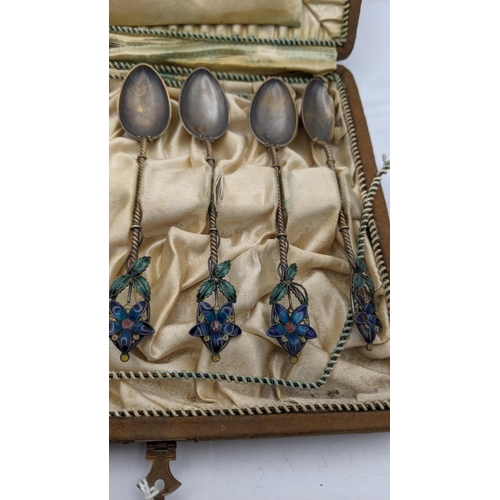 89 - Six Continental coffee and enamel spoons in case, total weight 46.5g
Location: A4T