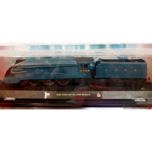 89 - Three model trains comprising an Amer 1938 class A4 No:4468 Mallard on stand, a 1938 Class 80 No:622... 