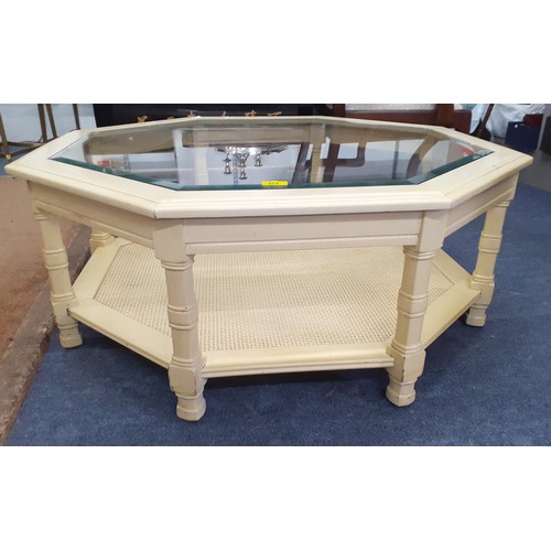 375 - A reproduction octagonal two tier coffee table with a glass top Location: RAB