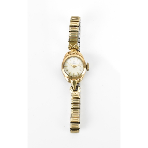 16 - A Tudor, manual wind, ladies, 9ct gold vintage wristwatch, the white dial having Tudor rose logo and... 