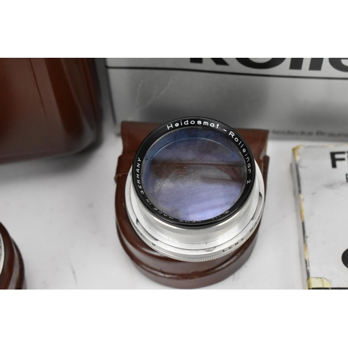 238 - A collection of Rollei lenses and filters, to include bay III lens filters in a leather case, UV-fil... 