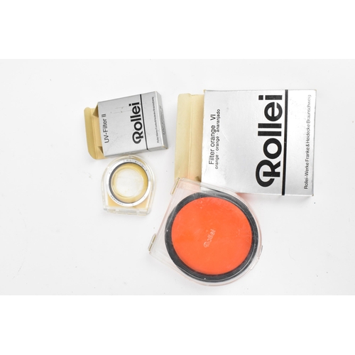 238 - A collection of Rollei lenses and filters, to include bay III lens filters in a leather case, UV-fil... 