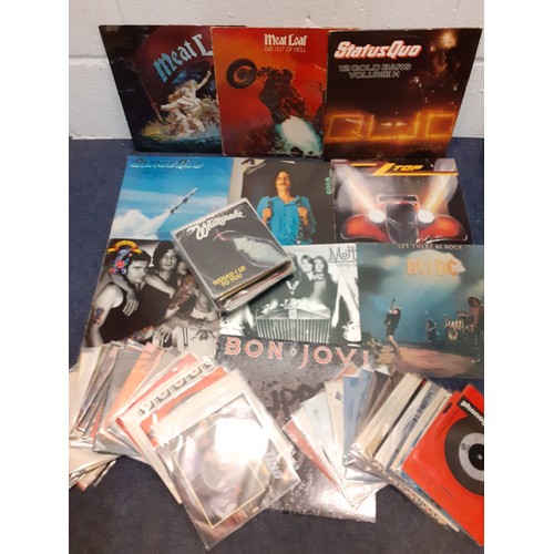 474 - A small quantity of Heavy Metal and Rock LP's and 45rpm singles to include Meat Loaf, Bon Jovi and S... 