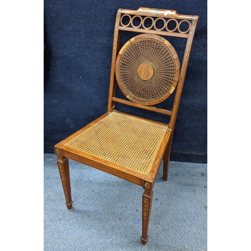 479 - An Edwardian satinwood Sheraton Revival side chair having Adams style decoration, having a caned bac... 