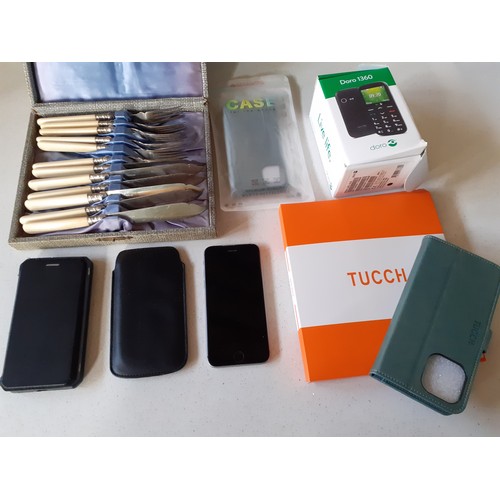 489 - A quantity of mobile phone accessories and phones to include a Doro 1360 mobile phone, a Tucch case ... 